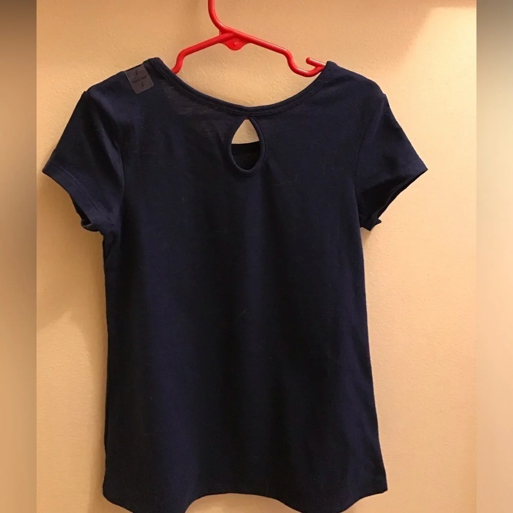 Justice girl’s dark blue size 7 t-shirt. New with size tag on shoulder